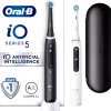 Oral B iO 5 black and white electric toothbrushes Designed by Braun
